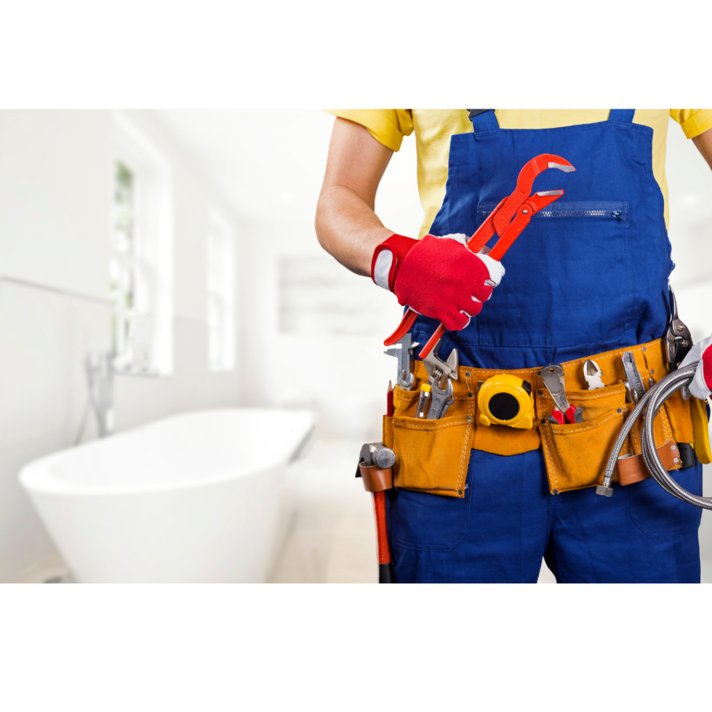 Plumber in a white bathroom