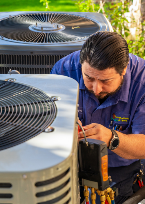 Quarter Moon Blog Images 1 close up view of a tech working on an ac unit