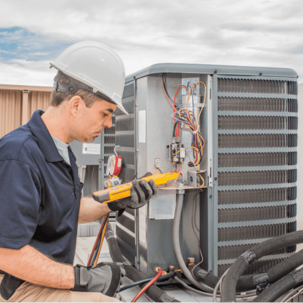 Tech doing an hvac tune-up